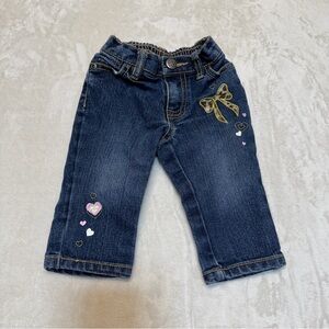 4/20$ Baby blue denim with bow and hearts size 6-9 months